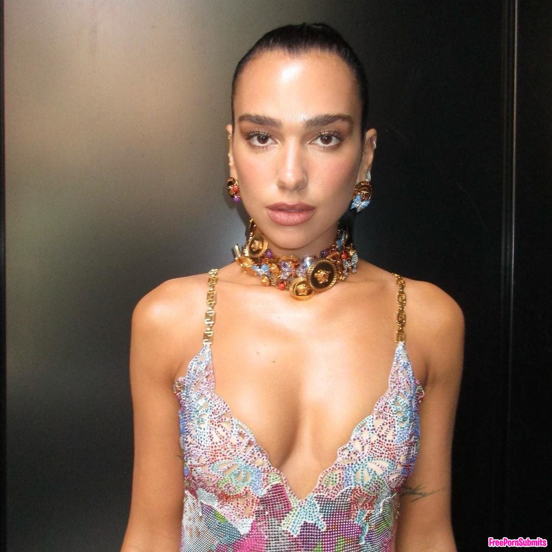 Dua Lipa AI video (she comes out her boobs) photo featuring Dua Lipa