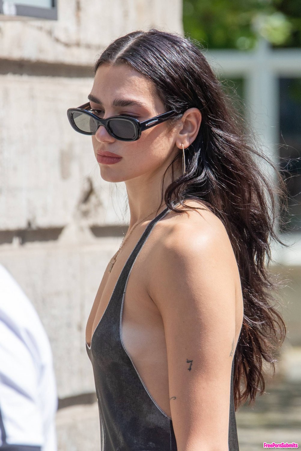 Dua Lipa AI video (she comes out her boobs) photo featuring Boobs