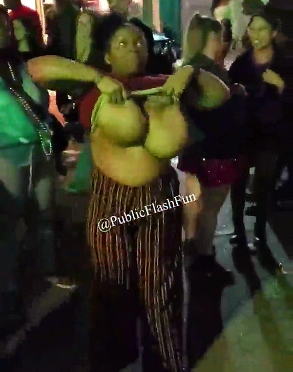 Thumbnail for Flashing her huge tits in public