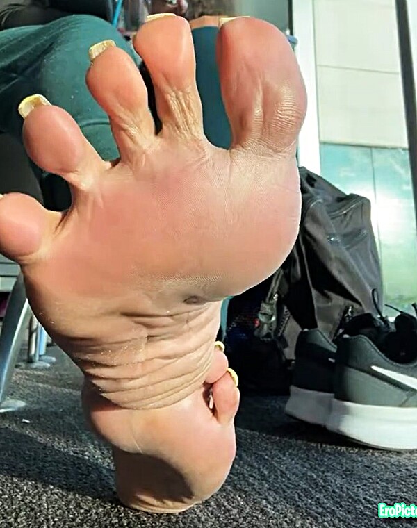 Thumbnail for Feet at the airport. On her way to do footjob, handjob, and foot worship sessions. (no audio)