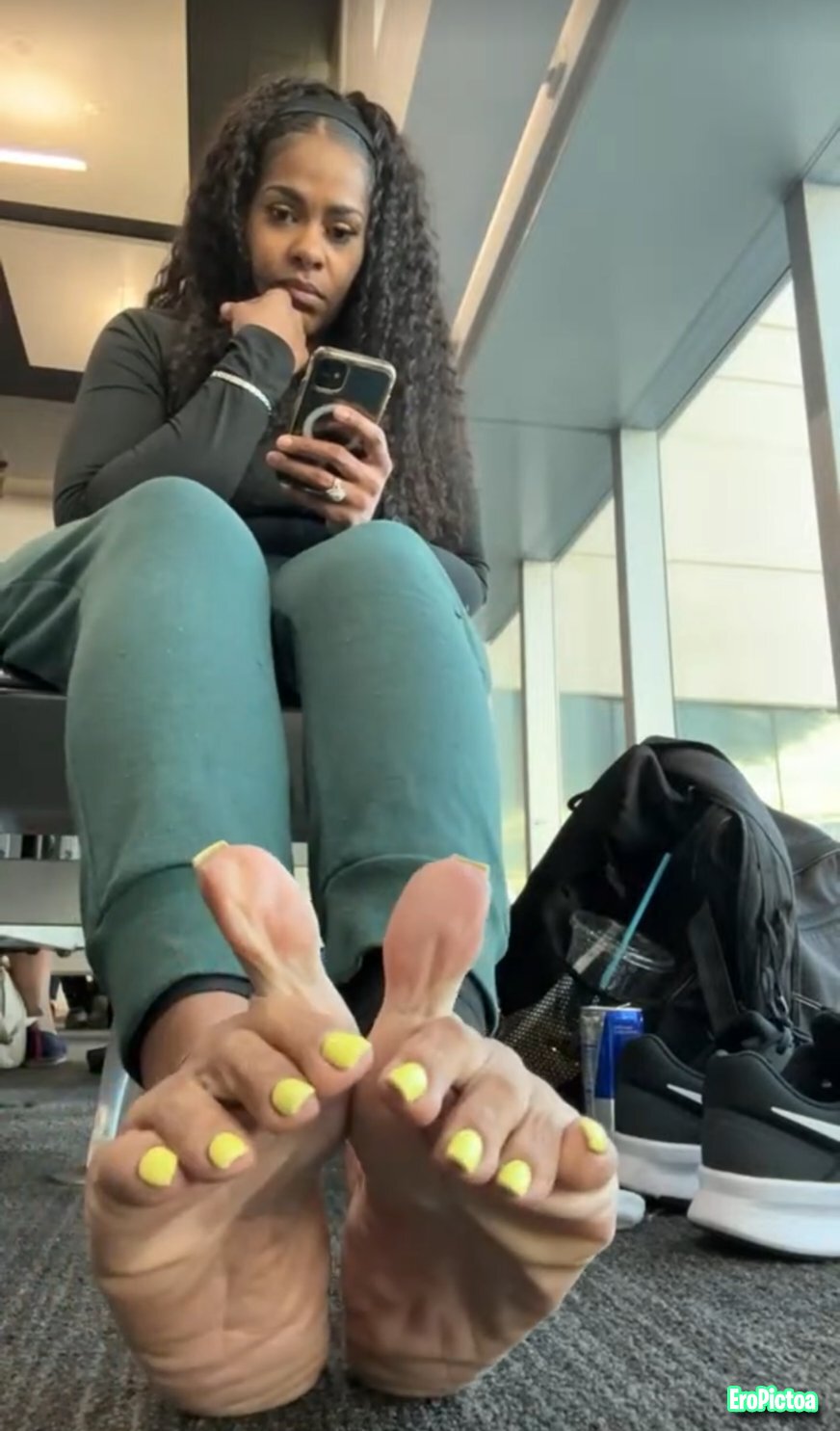 Feet at the airport. On her way to do footjob, handjob, and foot worship sessions. (no audio) photo featuring foot fetish